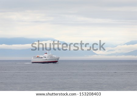 Ferry, Washington State, Olympic Peninsula. The ferry, Carrying passengers and vehicles, from Port Angeles in Washington State to Victoria\'s Inner Harbor. British Columbia, Canada.