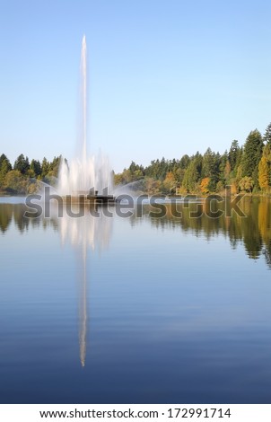 Stanley Park, Lost Lagoon Fountain, Vancouver vertical. The Jubilee Fountain in Stanley Park\'s Lost Lagoon. Vancouver, British Columbia, Canada.