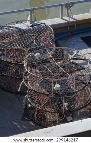 Crab Traps on Deck. Crab pots sit ready on the deck of a crab boat.