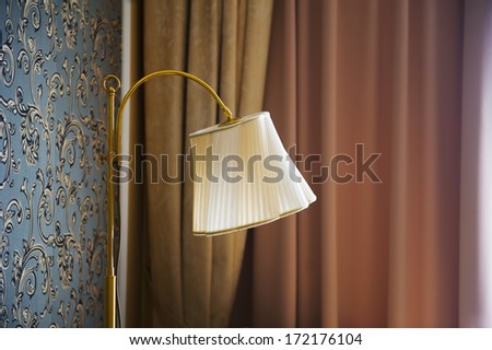 Beautiful wall lamp in the room