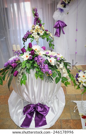 wedding decoration in purple style table with flowers.