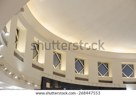 Interior building architectural design detail ceiling top with windows.