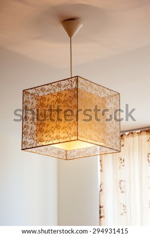 beautiful lamp on the ceiling in the bedroom