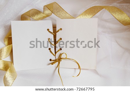 Greeting card with gold tapes