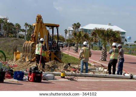 Construction Crew and backhoe