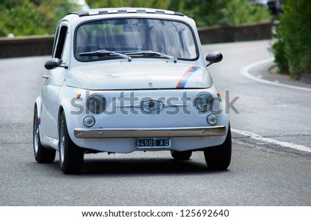 FLORENCE, ITALY - MAY 19: Fiat 500 Abarth along Via Bolognese during the 1000 miles on May 19, 2012 in Florence, Italy