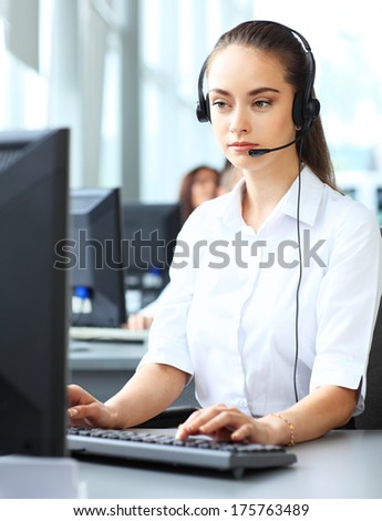 Female Customer Support Operator With Headset And Smiling