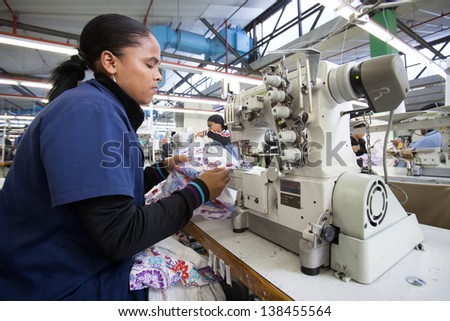 Cape Town, South Africa - Aug 2: A Woman Creates A New Garment In A Large Clothing Factory In Cape Town, South Africa On August 2, 2012