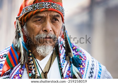 LAKE ATITLAN, GUATEMALA - SEPTEMBER 20: A candid portrait of a Mayan shaman during his performance of a traditional fire ceremony, Guatemala on September 20, 2009