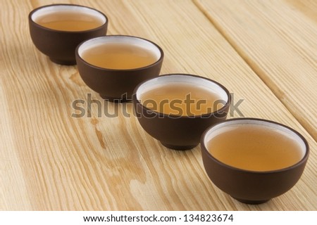 Chinese traditional teacups with green tea