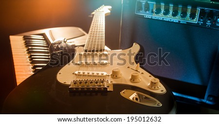 Guitar and piano keyboard.
