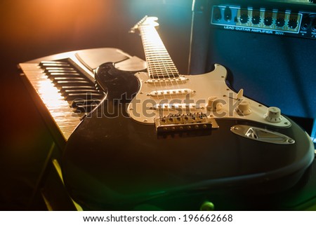 Guitar and piano keyboard.