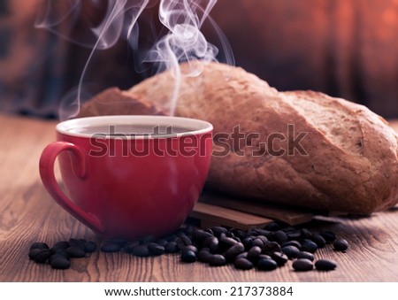 Coffee and bread  on the wooden table