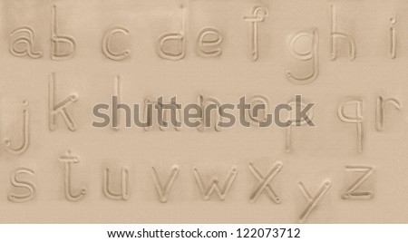 alphabet from sand. Small letters.