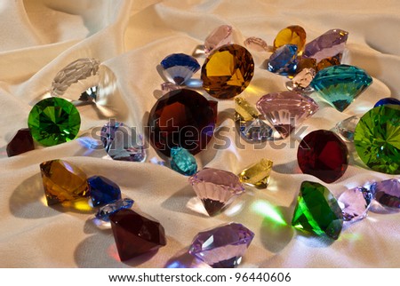 Collection of glass gems with red in center