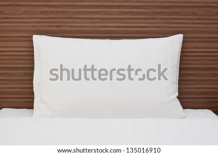 White Pillow On a Bed