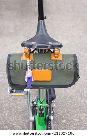 the back of an old bicycle with bag