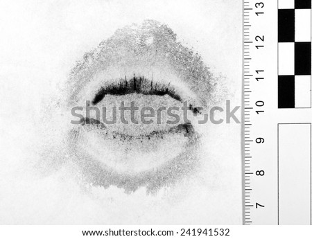 Lips print on white paper.