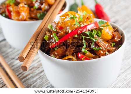 Fried rice noodles with shrimp - selective focus.