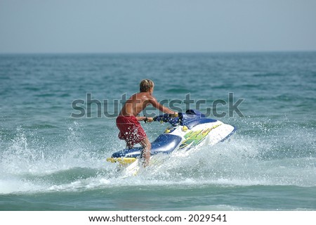 Young man and his jet-ski