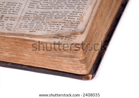 Old bible, over 100 years old, taken on clean white background.