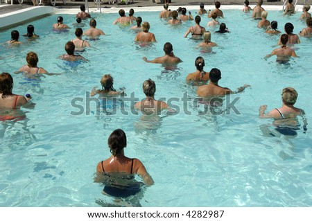 People are doing aerobic in pool