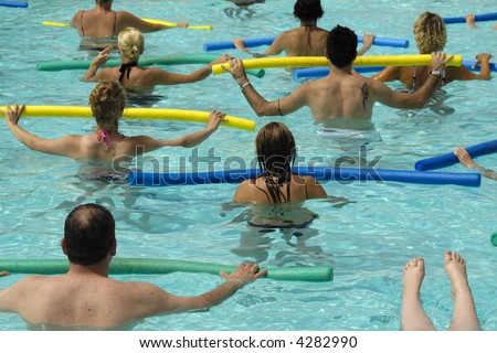 People doing water aerobic in pool
