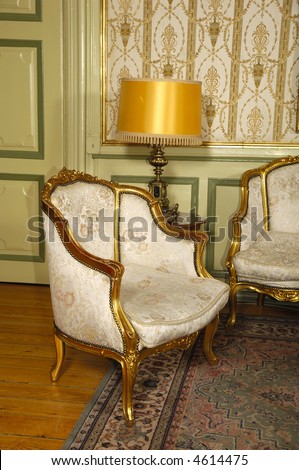Elegant room with antique an armchair