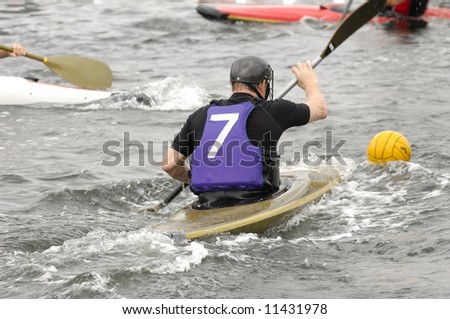 Man is palying kayak polo