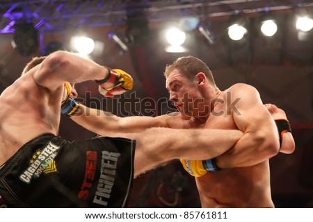 AMMAN, JORDAN - SEPTEMBER 8 : Cathal Pendred (Right) vs Danny Mitchell (left) ends in a Draw, Cage Warriors Championship Fight Night 2, Fight Card on September 8, 2011 in Amman, Jordan