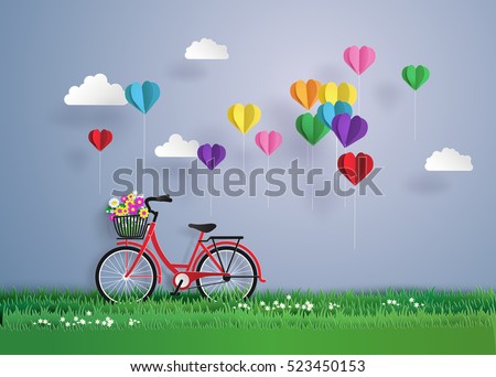 Bicycle in the garden with colorful hot air balloon heart sharp.origami and paper art style.