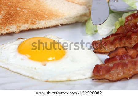 fried egg and bacon breakfast