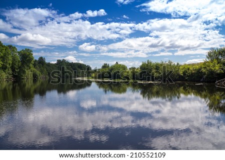 Maskinonge River Quebec Canada landscape in summer with a beautiful blue sky