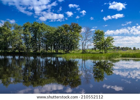 Maskinonge River Quebec Canada landscape in summer with a beautiful blue sky