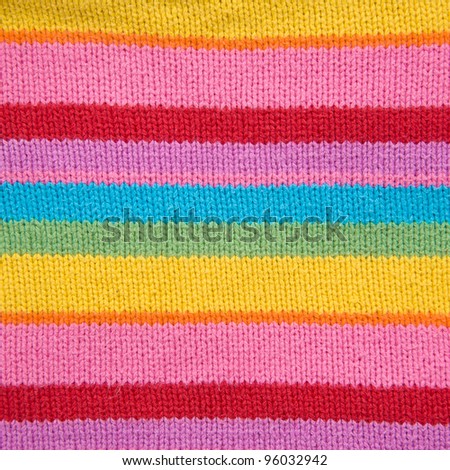 Knit woolen texture. Fabric multicolor background
