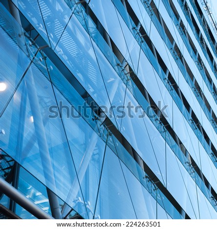 Abstract architecture fragment with blue wet steel panels
