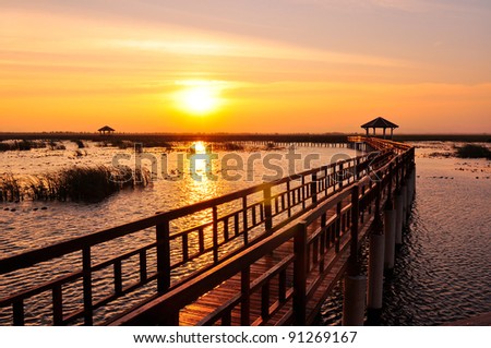 Boardwalk on the lake at sunset, Sam Roi Yod National Park, Prachuap Khiri Khan, Thailand
