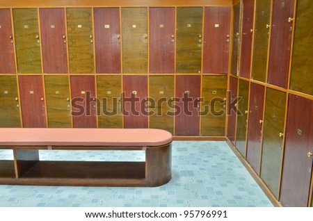 classic wood locker room and a bench