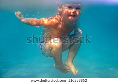 amazing, two years old baby boy dives underwater