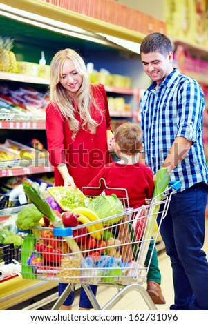 family shopping in grocery market