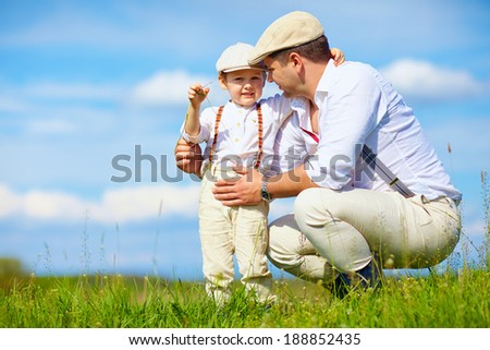 father and son, farmers in the countryside