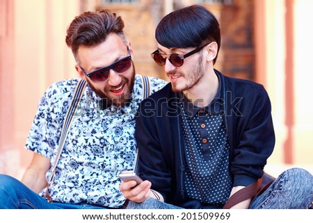 smiling friends chatting in social network