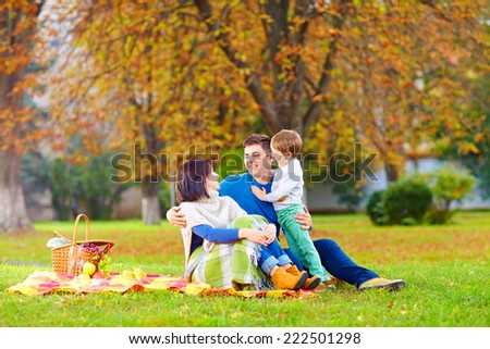 happy family together on autumn picnic