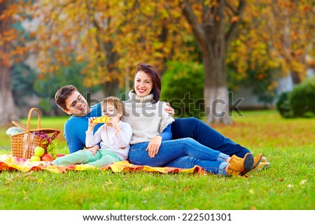 happy family together on autumn picnic