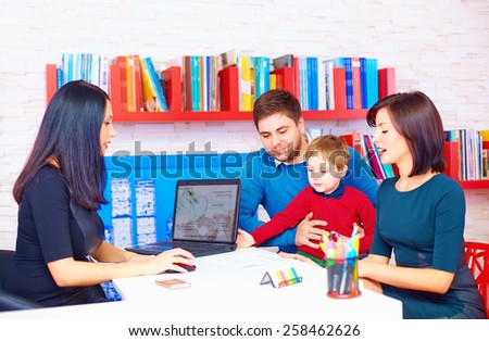 family in office, at the professional
