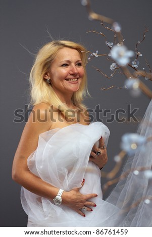 stock photo : sensual adult woman on mystic flower background wearing silver ... stock photo : sensual adult woman on mystic flower background wearing silver ...