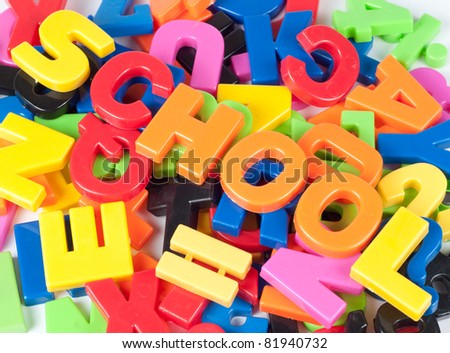 word school over heaps of colorful letters