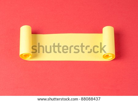 Yellow paper scroll on red background