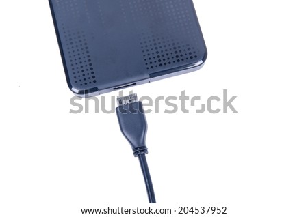 External hard disk and USB cable Unplug isolated on white background.