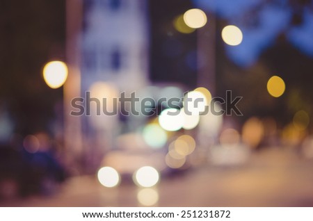 Defocused urban abstract background, artistic style and colors, filtered image for retro scent